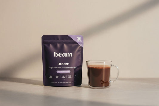 Beam Dream Sleep Powder on beige background.
