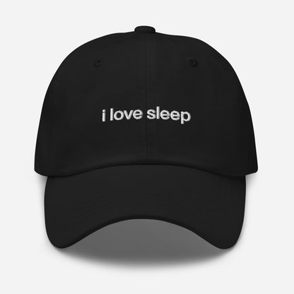 Black I Love Sleep dad hat with embroidered lettering and adjustable strap.