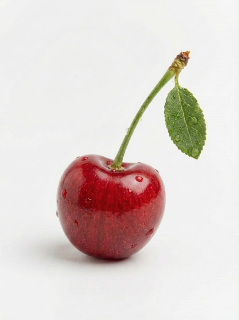 A fresh red cherry representing the cherry flavor profile of the Som Sleep drink.